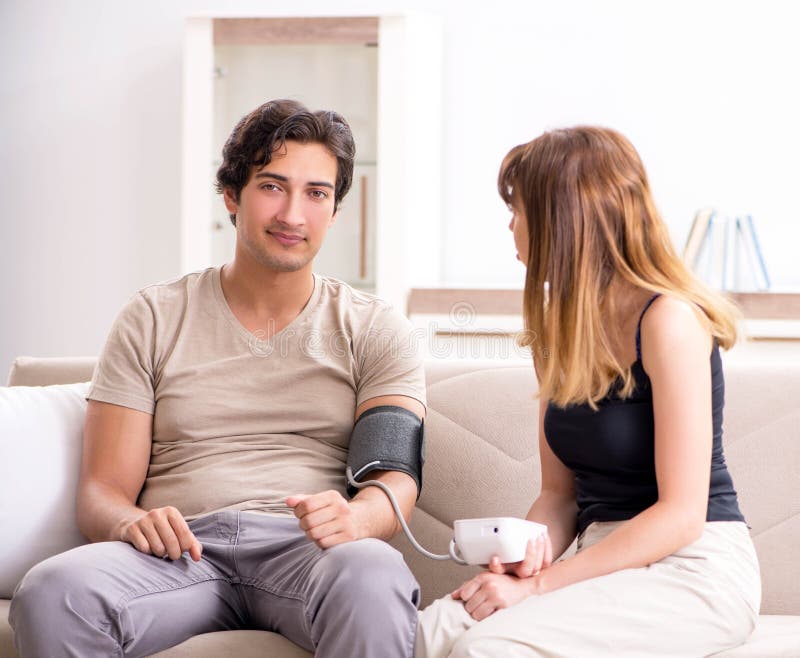 Wife Checking Husband`s Blood Pressure Stock Photo Image of frustrated, frustration 183387460