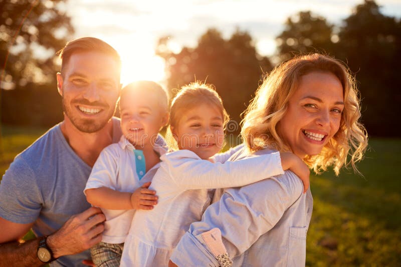 Wife and husband with children in nature royalty free stock photo Wife and husband with children in nature royalty free stock photo