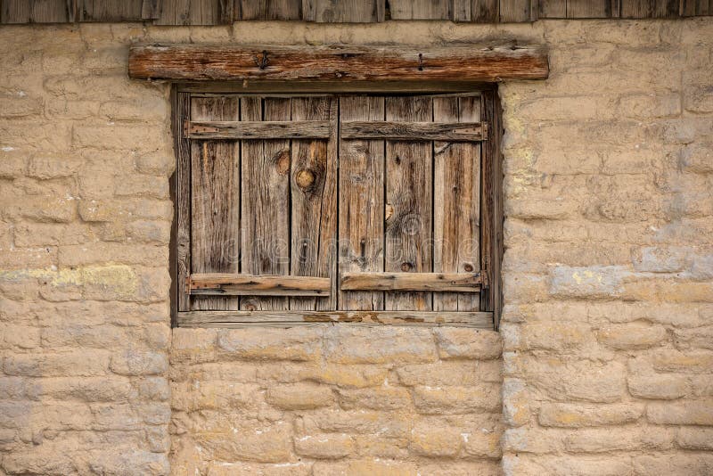 Wild west adobe with wooden windows