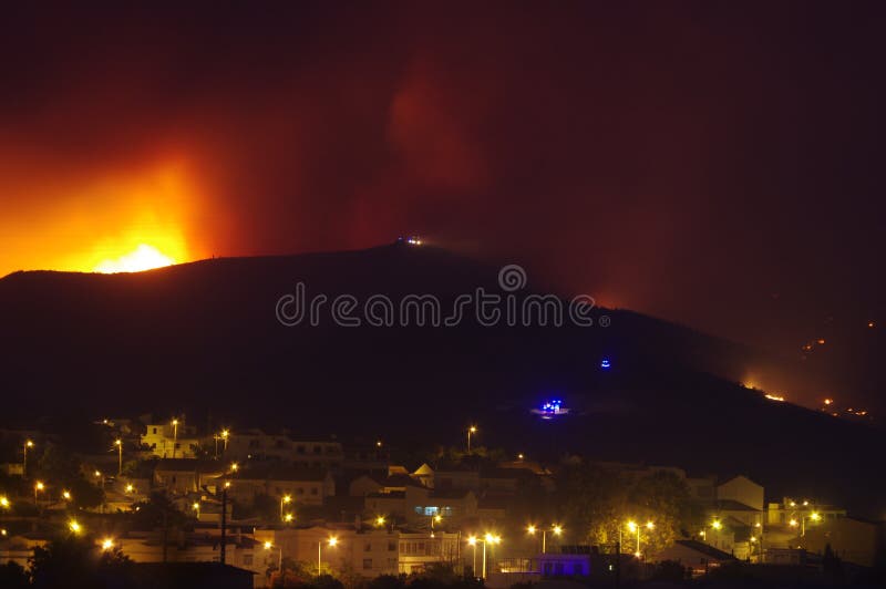 Wildfire burning near city