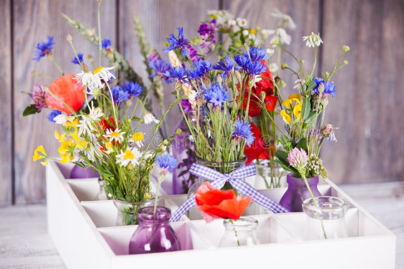 Wildflowers in bottles stock image. Image of fresh, light 41921893