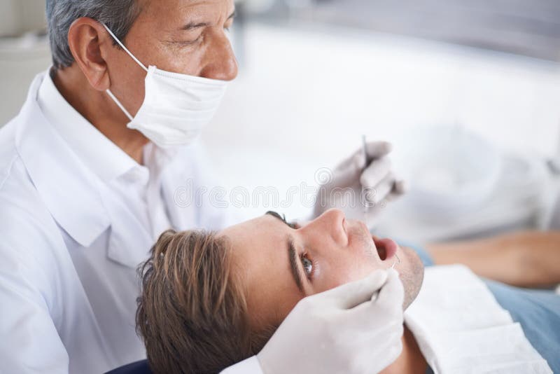Will I Need a Filling. a Young Man at the Dentist. Stock Image Image
