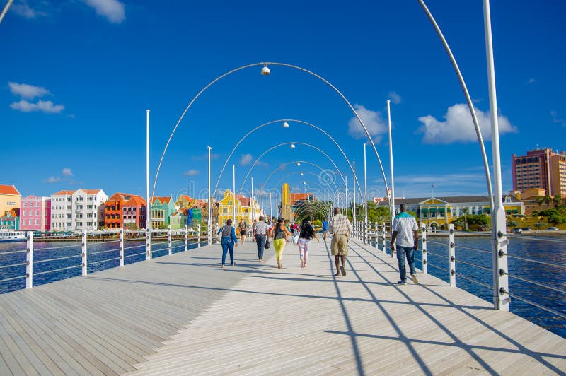 WILLEMSTAD, CURACAO - NOVEMBER 1, 2015: Queen Emma Bridge is a pontoon bridge across St. Anna Bay royalty free stock photo WILLEMSTAD, CURACAO - NOVEMBER 1, 2015: Queen Emma Bridge is a pontoon bridge across St. Anna Bay royalty free stock photo