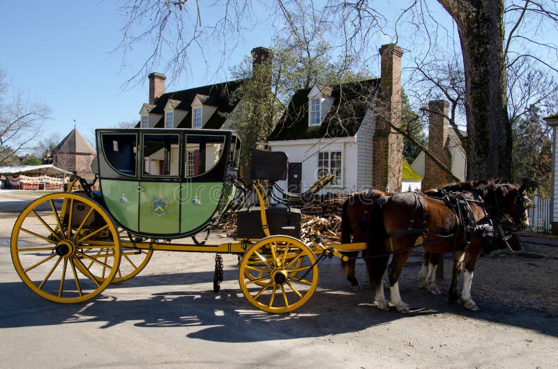 Williamsburg Virginia - historisk lagledare med hästar royaltyfri bild Williamsburg Virginia - historisk lagledare med hästar royaltyfri bild