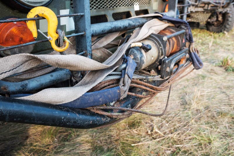 A Winch Device is Attached To the Bumper of the SUV To Pull Stock Photo Image of extreme