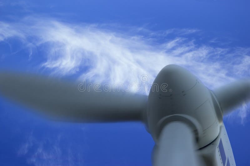 Wind Energy Generator closeup on blue sky. Regenerate stock images, royalty-free photos and pictures