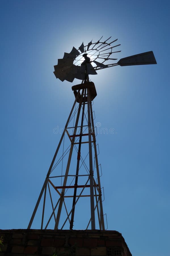 Farm wind mill silhouette - Backlight