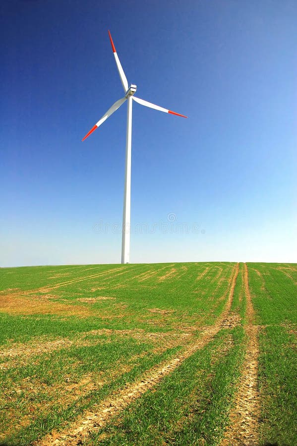 windmühlenturbine im feld am sommertag. drehender Windgenerator 17526937  Stock-Photo bei Vecteezy