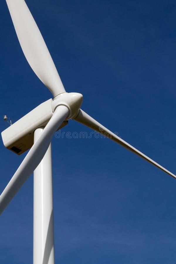 Wind turbine on blue sky