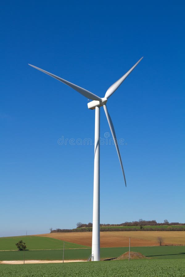 Wind turbine on blue sky