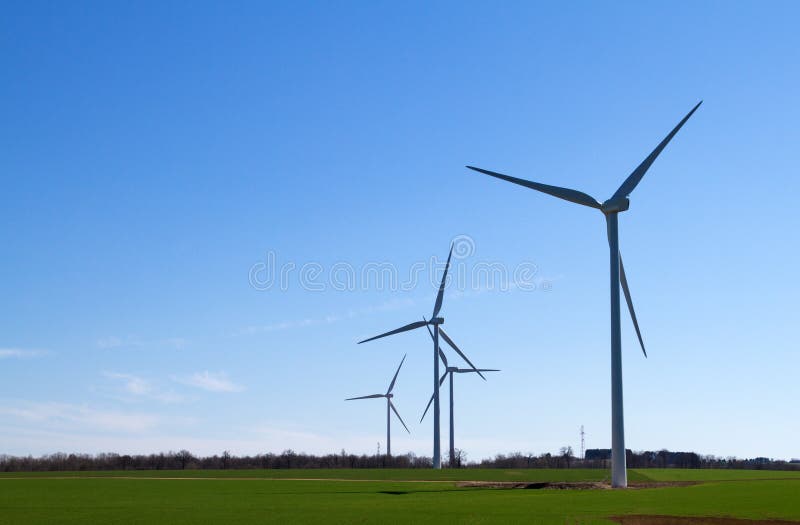 Wind turbine on blue sky