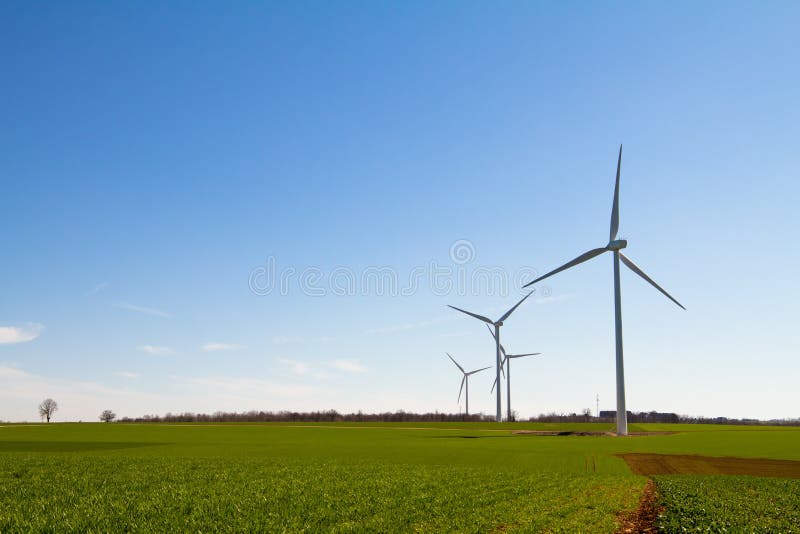 Wind turbine on blue sky