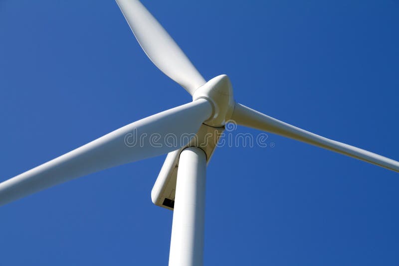 Wind turbine on blue sky