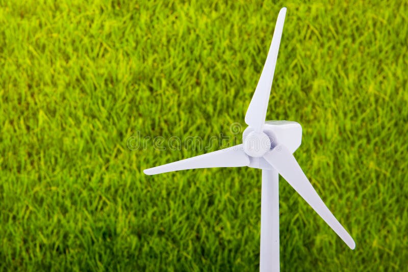 Wind turbine with grass background