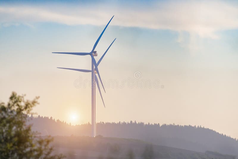 Wind turbine on sunset