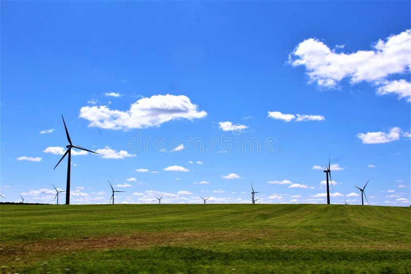 Wind Turbines in a rural country grass field located in Chateaugay, Franklin County, in upstate New York, United States. Wind Turbines in a rural country grass field located in Chateaugay, Franklin County, in upstate New York, United States.