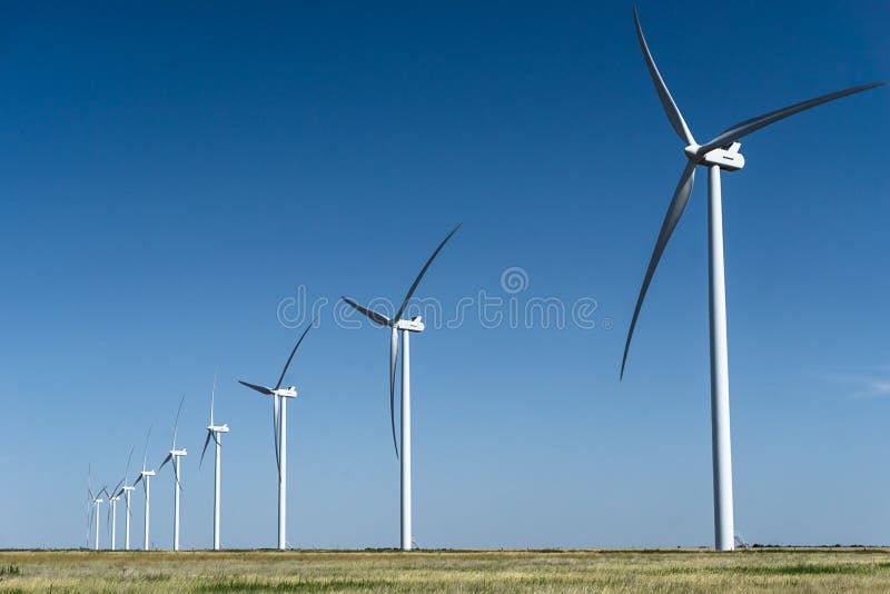 Wind turbines on a wind farm under a clear blue sky. Texas wind energy turbines stock images, royalty-free photos and pictures
