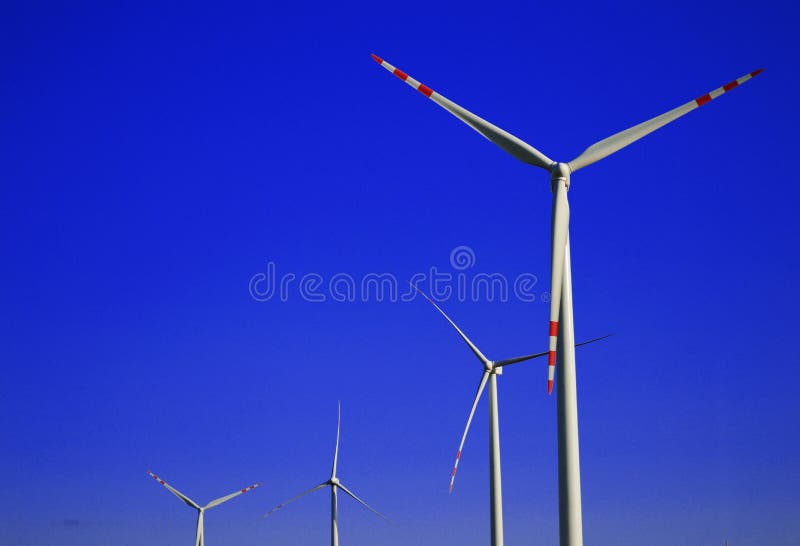 Wind turbines farm. Windmill