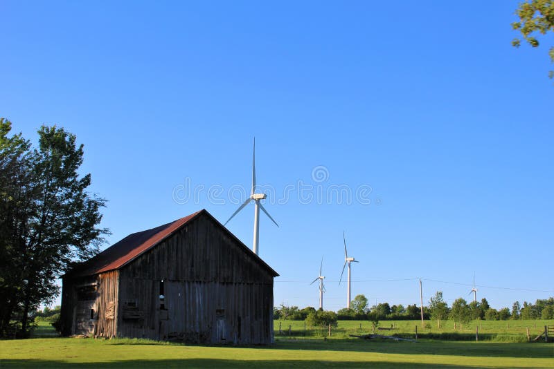 Wind Turbines in a rural country grass field located in Chateaugay, Franklin County, in upstate New York, United States. Wind Turbines in a rural country grass field located in Chateaugay, Franklin County, in upstate New York, United States.