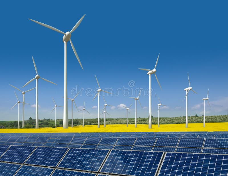 Wind turbines and solar panels in a rapeseed field