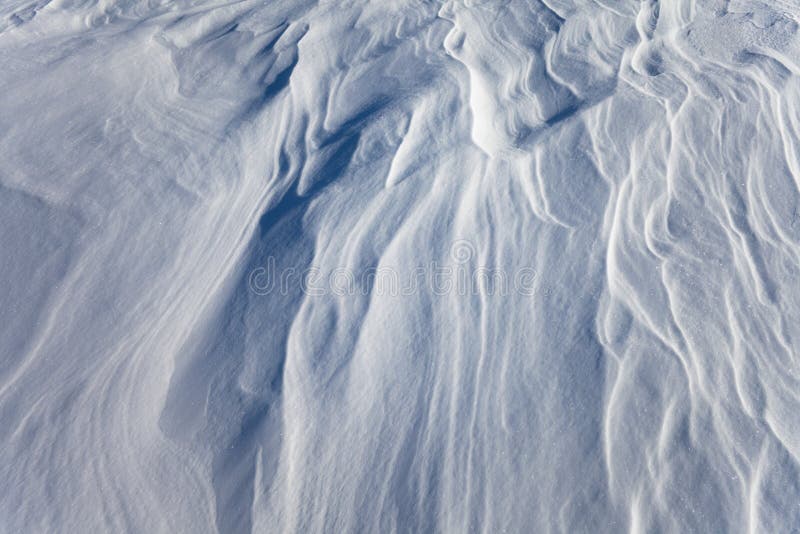 Wind created patterns on surface of packed snow. Wind created patterns on surface of packed snow