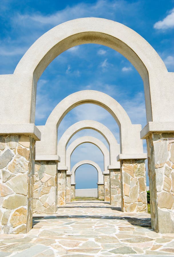 Winding corridor with arch door decoration