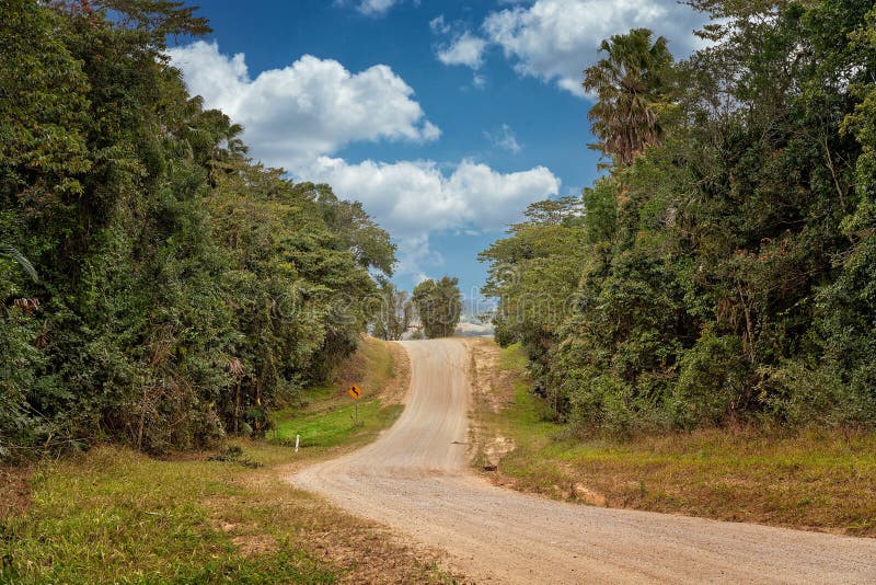 A Winding Country Dirt Road Leading Over a Hill Stock Image - Image of ...