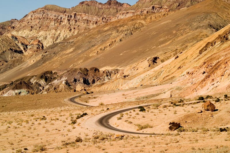 Winding desert road stock photos
