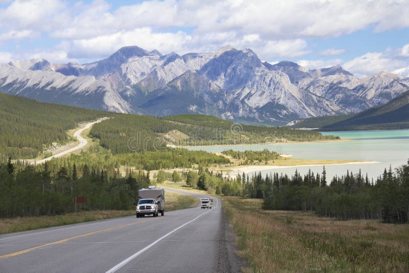 Winding Highway Next to a Mountain Lake - Alberta, Canada