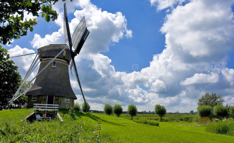 A dutch windmill inside a rural environment. Wind tower architecture stock images, royalty-free photos and pictures