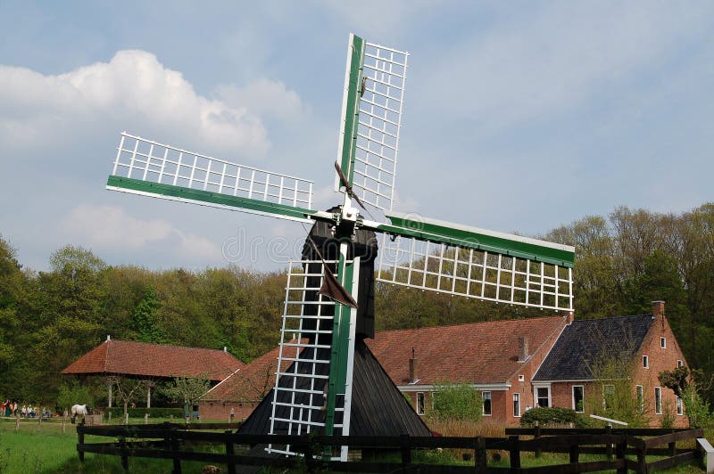 Windmill and farm in the Netherlands