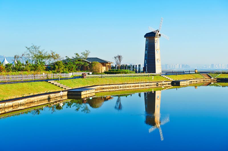 The windmill lakeside sunrise