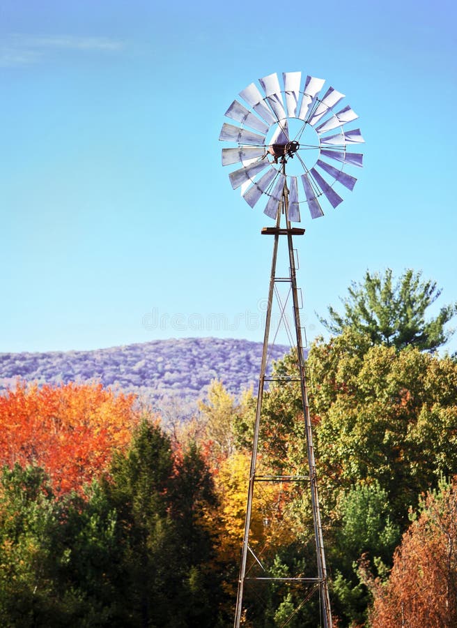 Windmill amongst beautiful autumn leaves. Metal n stock images, royalty-free photos and pictures