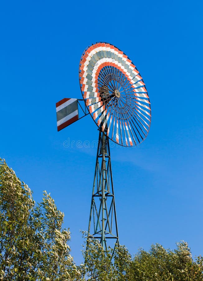 Windmill for pumping water stock photo. Image of farm 37086418