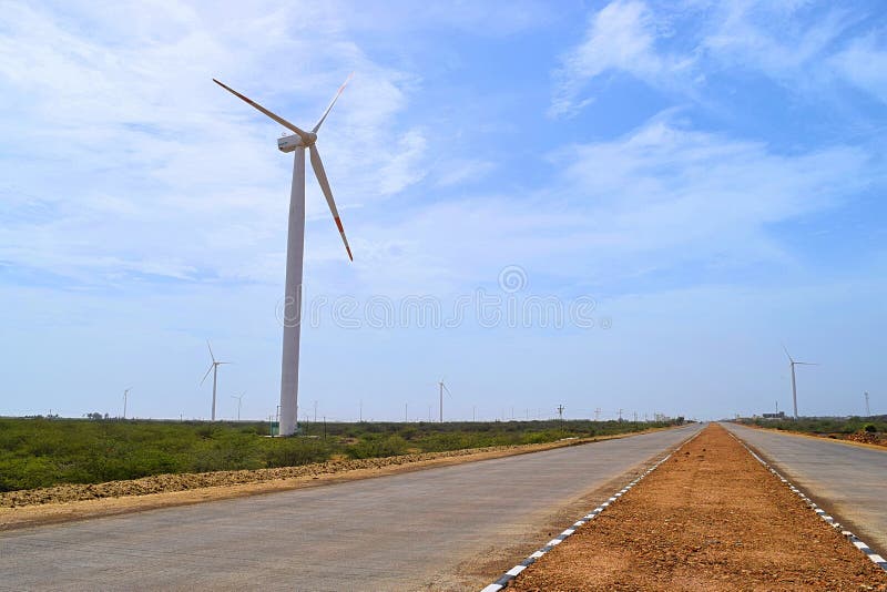 Windmill on side of Highway in India - Wind Power - Sustainable Renewable Energy