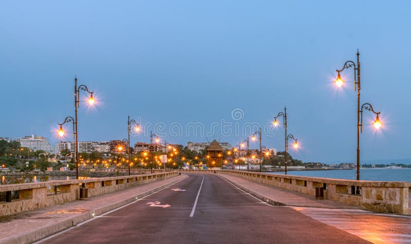 The Windmill on the street leading to Nessebar ancient city at sunrise on the Bulgarian Black Sea Coast. Nesebar or Nesebr is a royalty free stock photography The Windmill on the street leading to Nessebar ancient city at sunrise on the Bulgarian Black Sea Coast. Nesebar or Nesebr is a royalty free stock photography