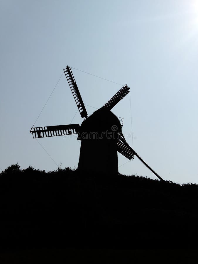 Windmill Sunset Silhouette stock image. Image of fingal 9479223