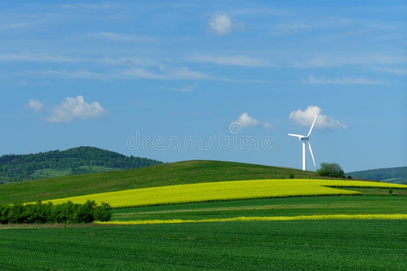 Windmill on a yellow-green field