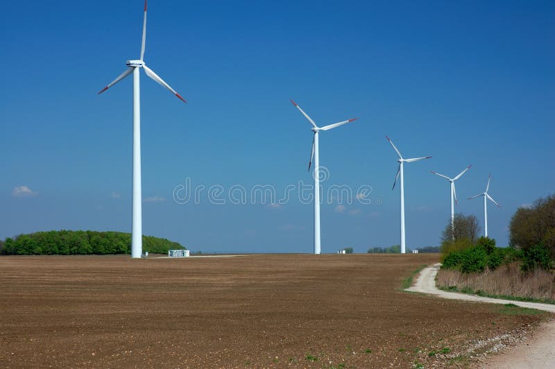 Windmills farm stock image. Image of farm, road, windmill 12656785