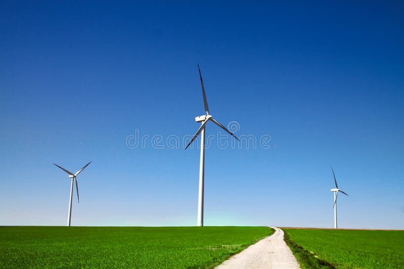 Windmills on the green grass