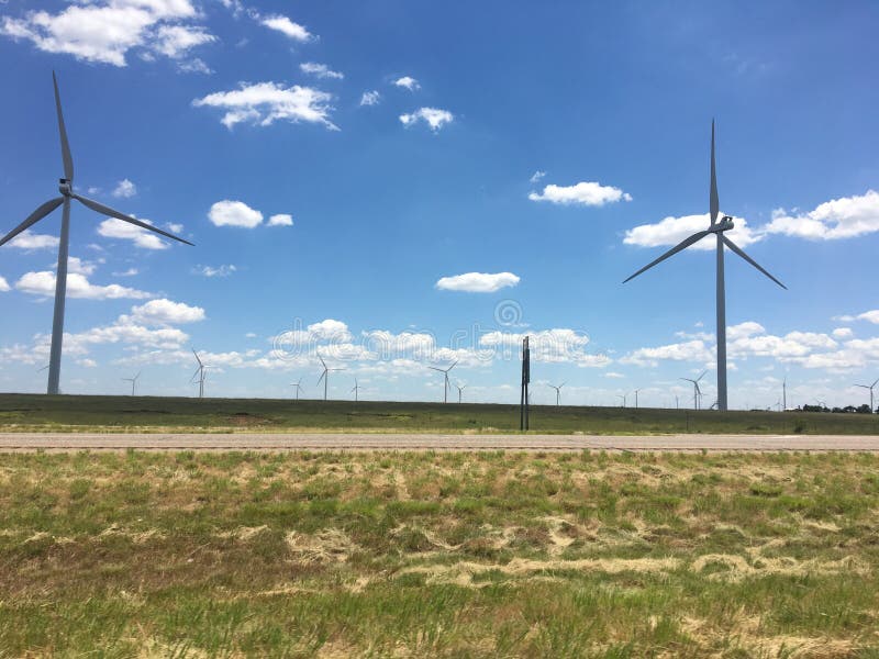 Big Sky Texas Windmills stock image. Image of plains, puddle 4383885