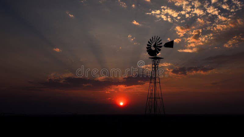 Windmolen met zon die achter Frankrijk plaatst royalty-vrije stock fotografie Windmolen met zon die achter Frankrijk plaatst royalty-vrije stock fotografie