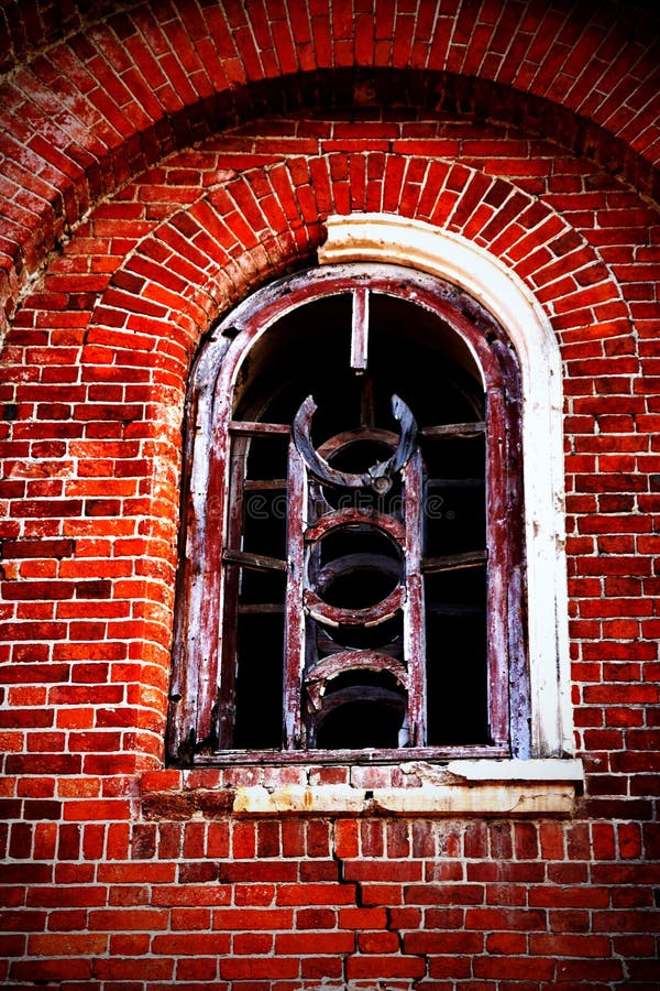 Window of creepy abandoned house.