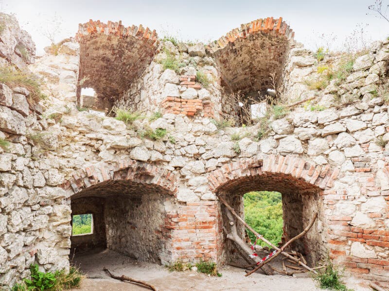 Window with crossed wooden bars for safety, Devicky castle ruin