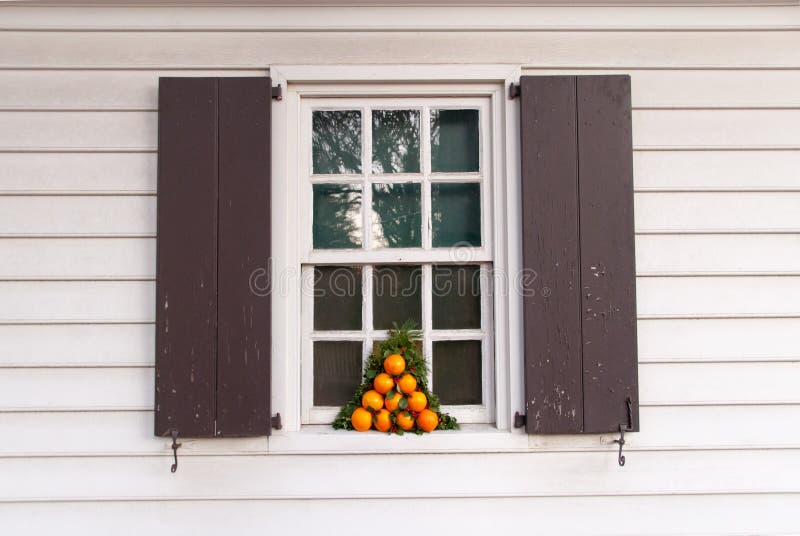 Window decorated with oranges for the holidays. royalty free stock images Window decorated with oranges for the holidays. royalty free stock images
