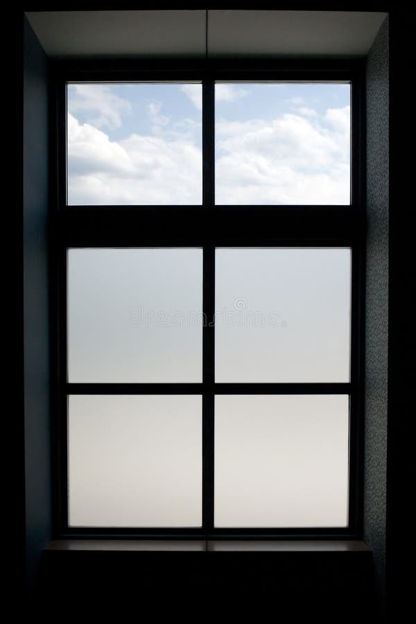 Interior view of a modern window that has frosted glass on the lower panes. Interior view of a modern window that has frosted glass on the lower panes.