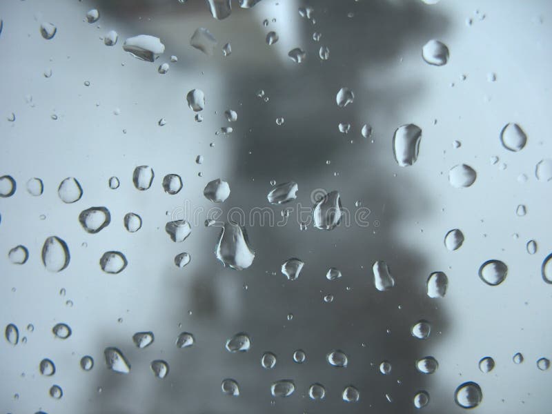 Window glass and rain drops