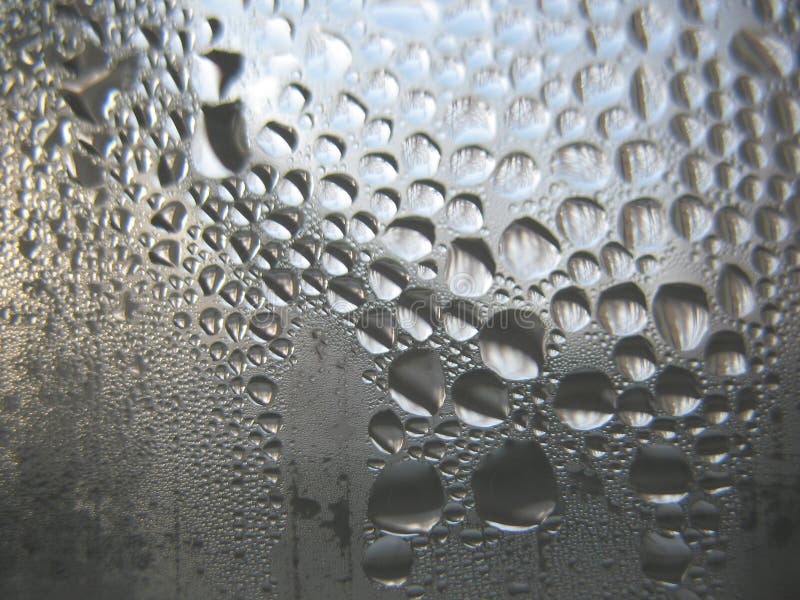 Window glass and rain drops