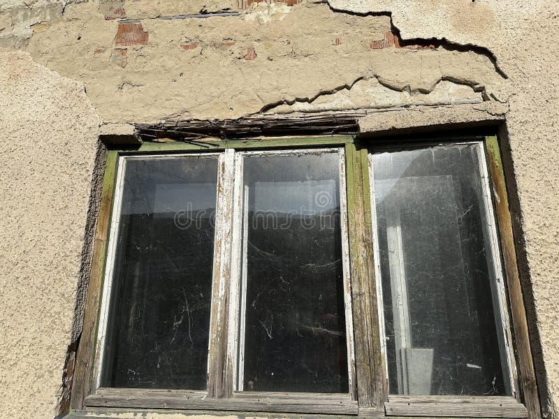 Window of an old ruined house stock image