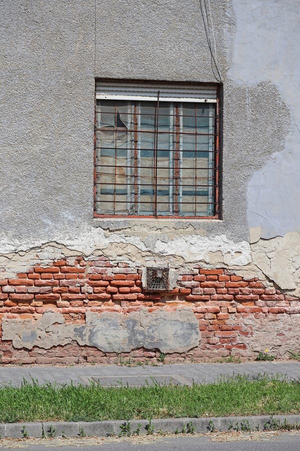 Window of an old ruined house in the city royalty free stock photos